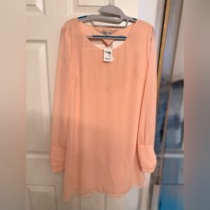 Pretty in Peach women’s Dress
With a Heart cutout on the back